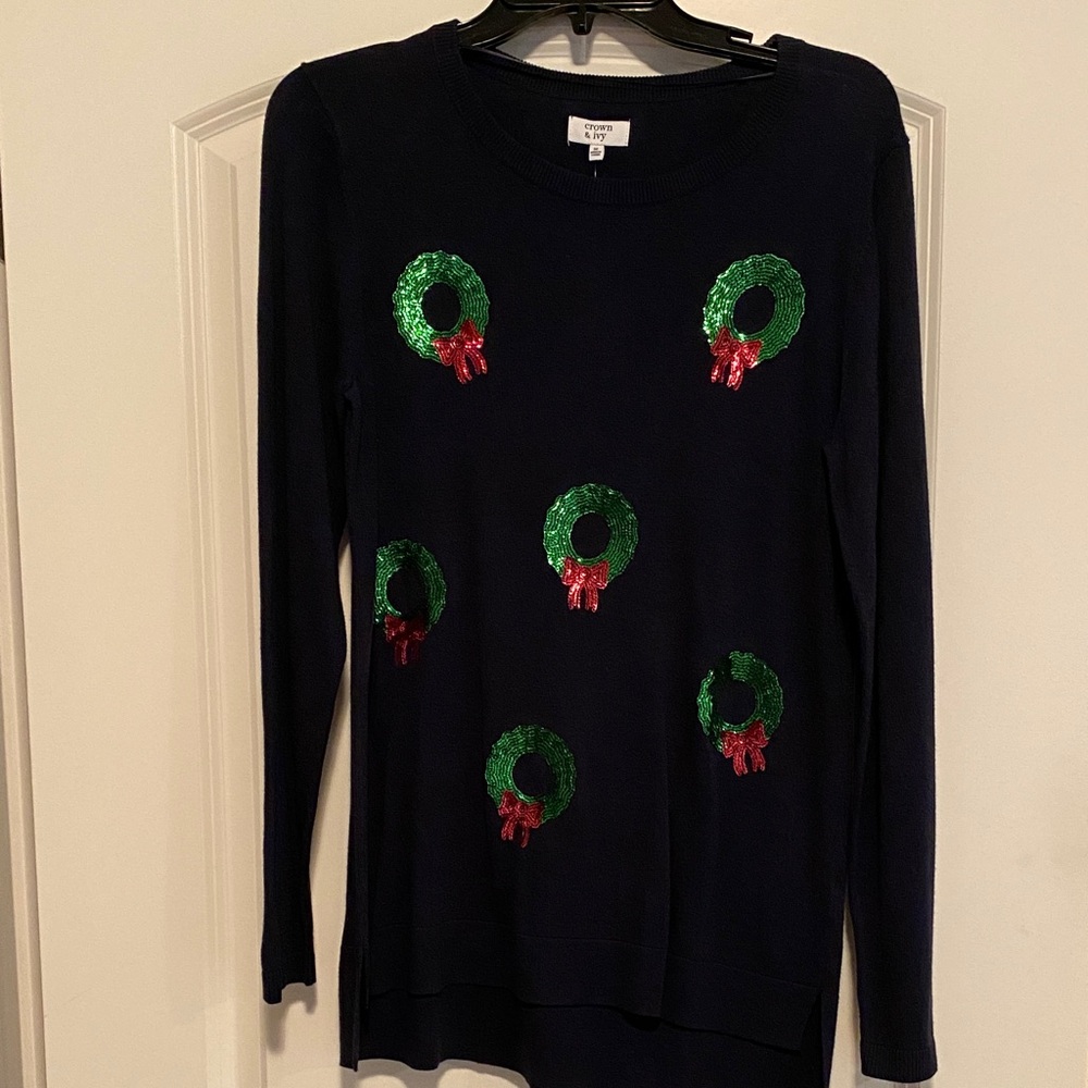 Crown & Ivy Navy Christmas Sweater with sequin wreaths.